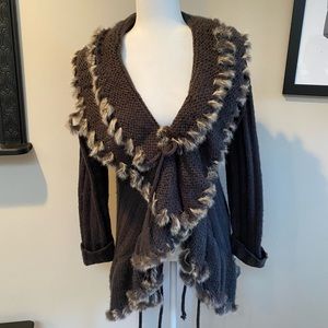 Brown/charcoal gray cardigan with fur trim and three ties in front.